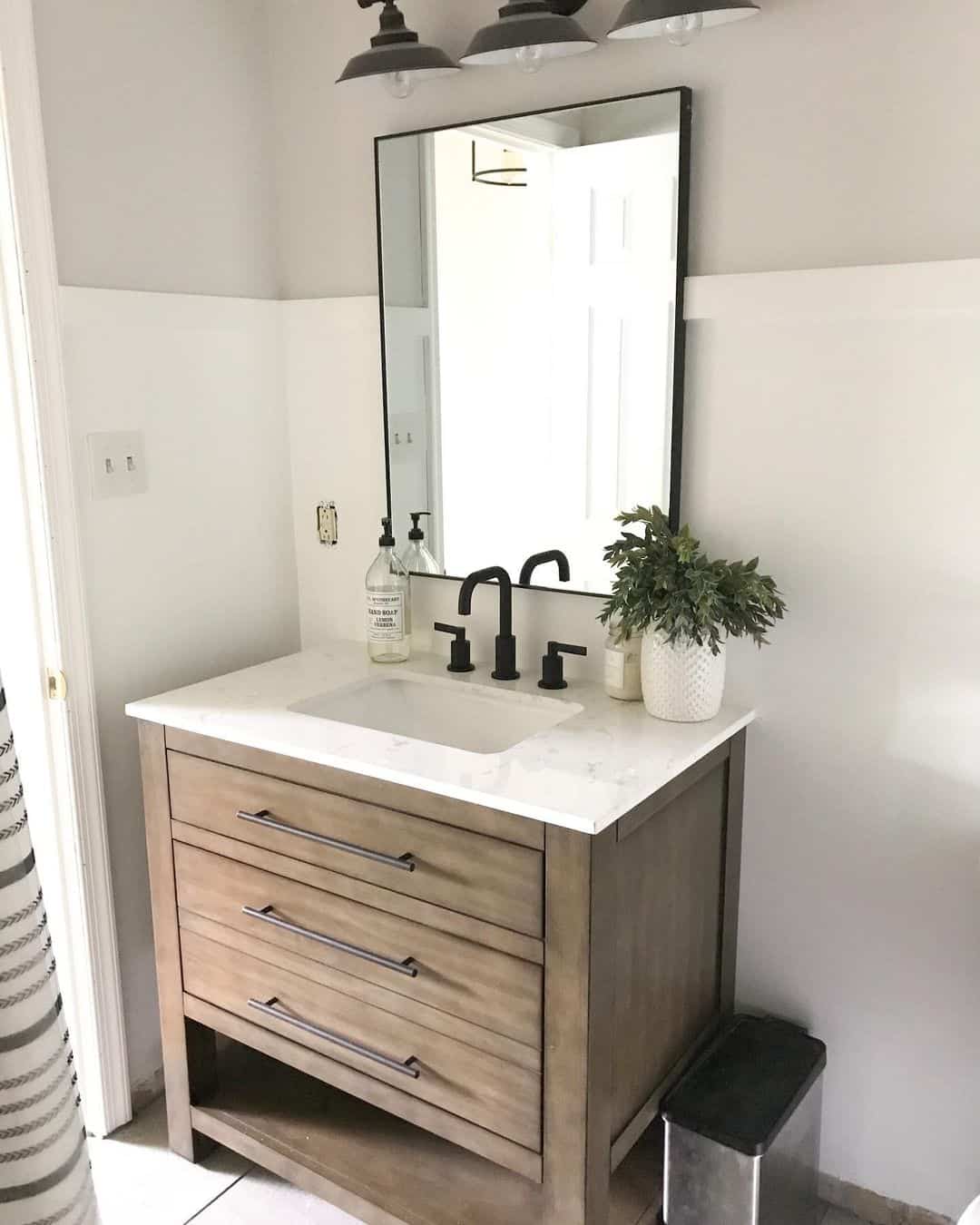 Wooden Vanity With Drawer Pulls Anchors the Farmhouse Style