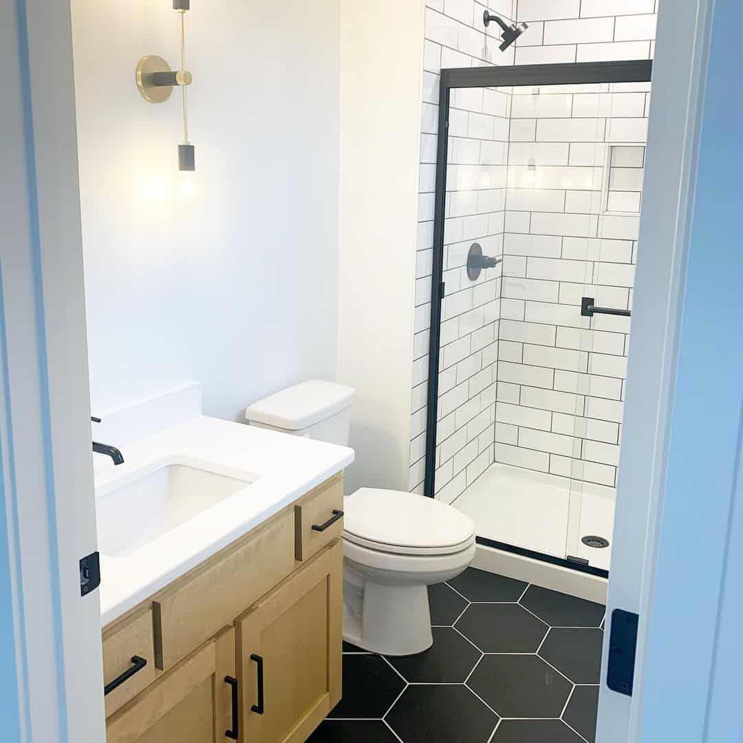 Matte Black Hexagon Floor Tiles Ground the Farmhouse Bathroom