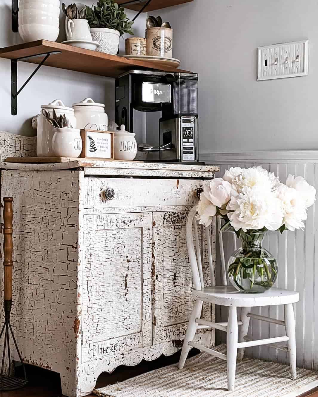 Distressed Cabinet Adds Rustic Charm to Coffee Bar Setup