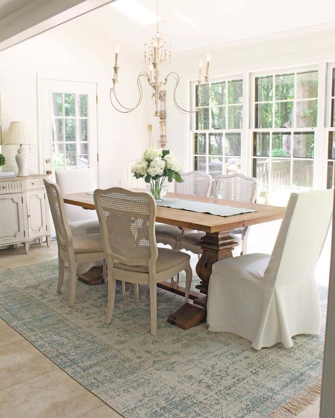 Faded Patterns on Light Blue and Cream Rugs