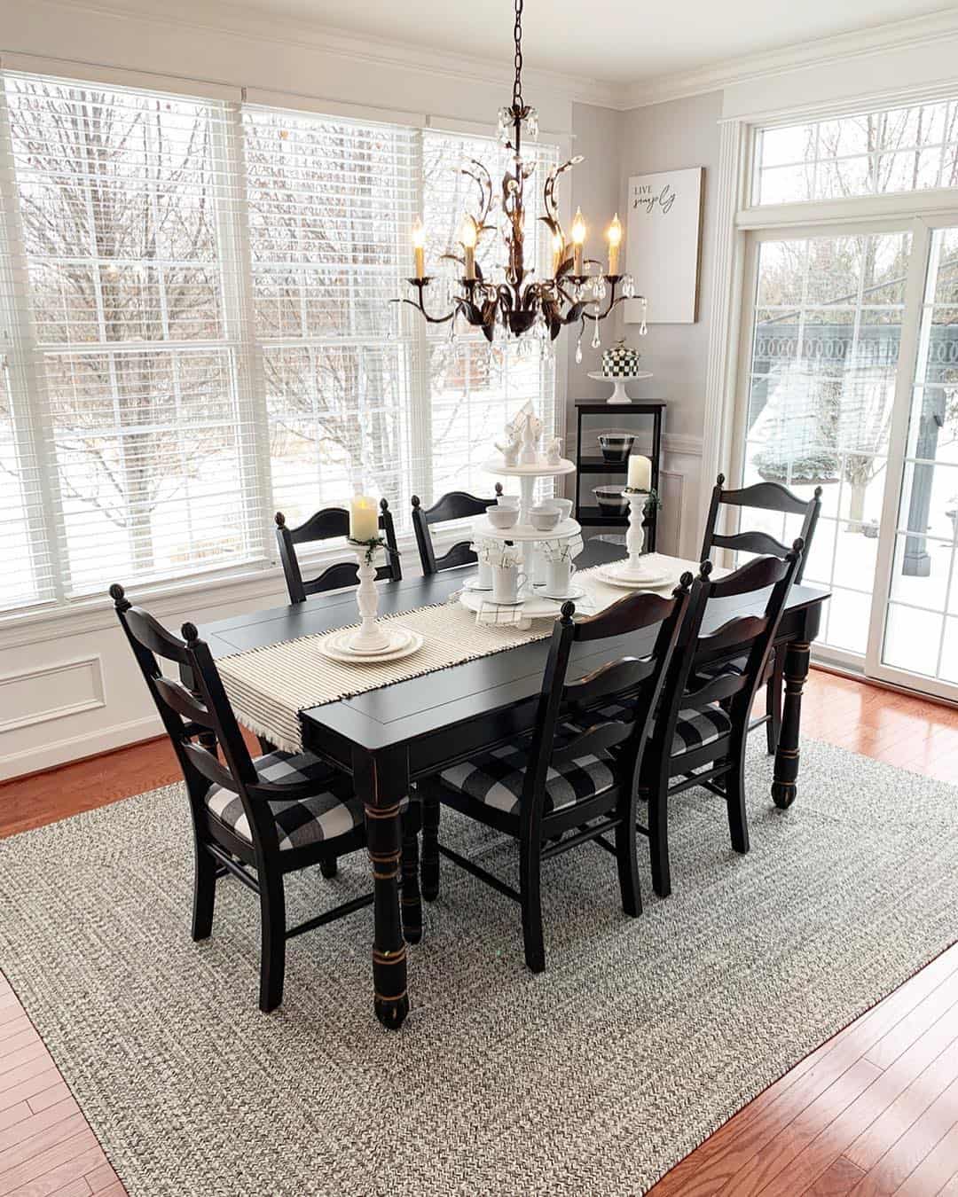 Textured Neutral Rug Under Black Farmhouse Table