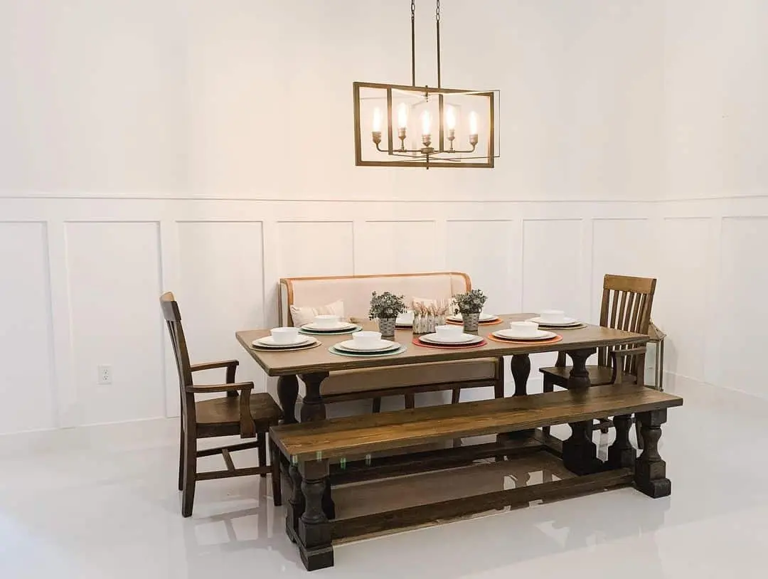 Dark Wood Farmhouse Table with Matching Bench and Upholstered Banquette