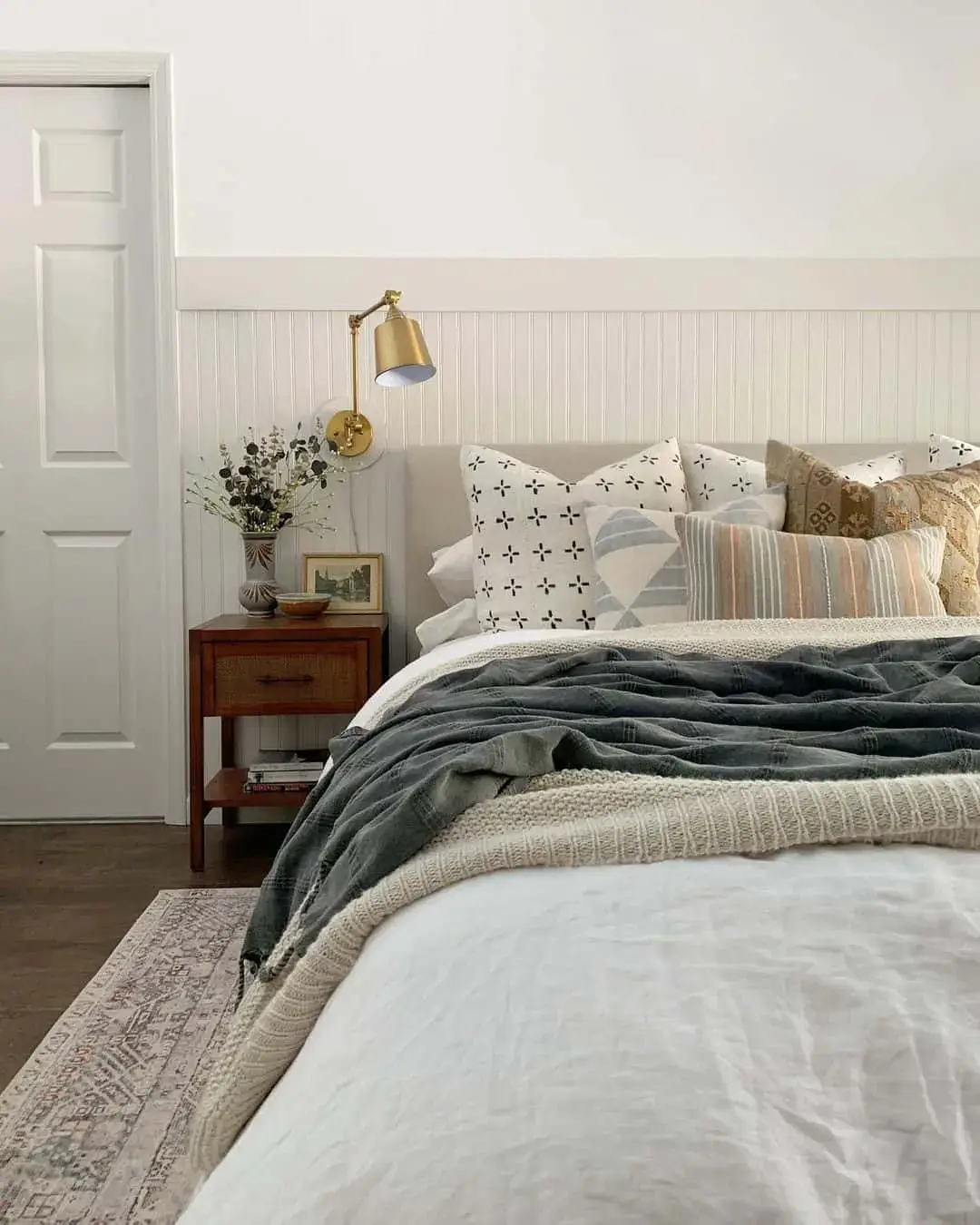 Brass Swing-Arm Sconce for Bedside Lighting
