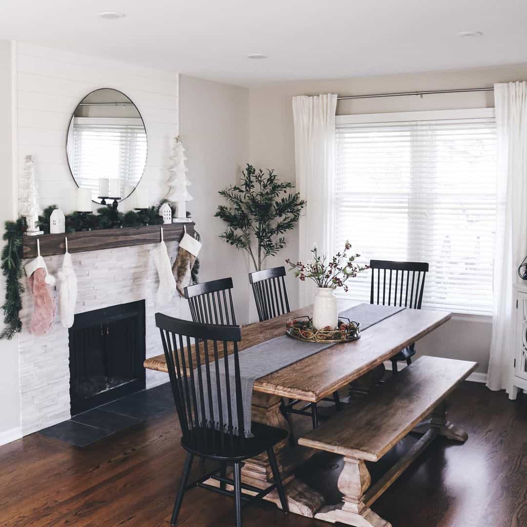 Round Mirror Above Fireplace Frames Seasonal Decor
