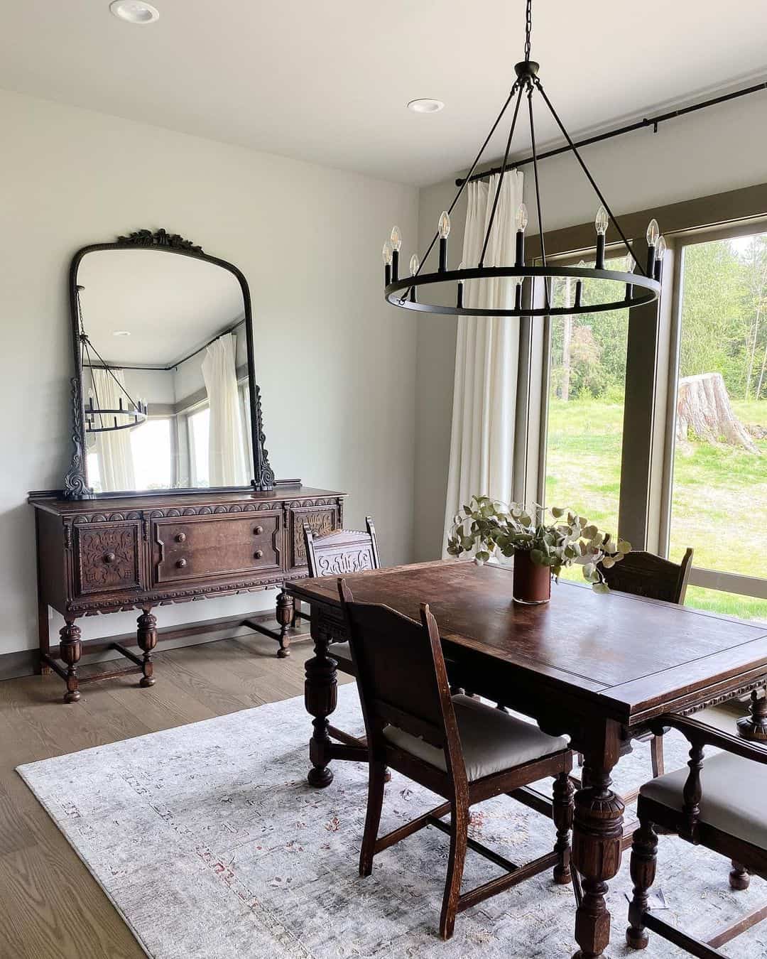 Tall Ornate Mirror Balances Carved Dark Wood Buffet