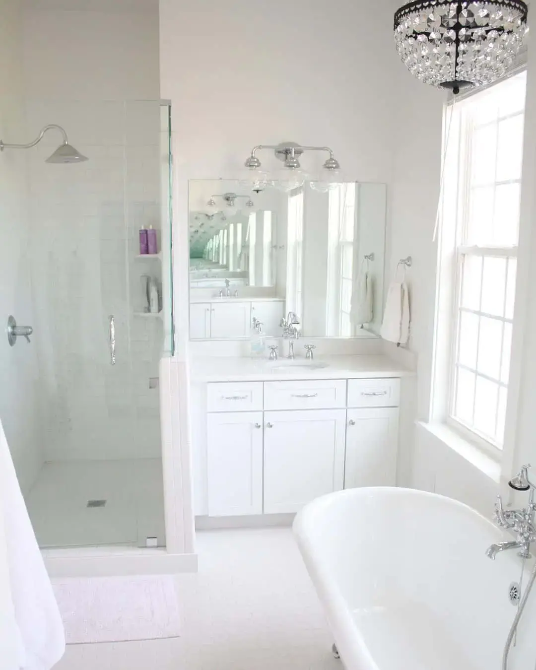 Black Crystal Chandelier Adds Dramatic Luxury Above the Tub