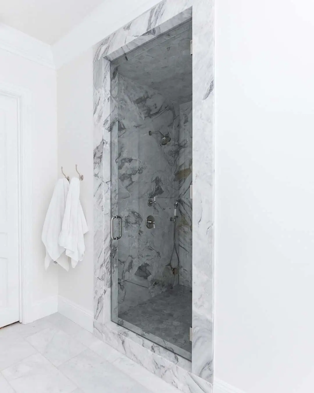 Marble Slab Shower Enclosure with Hexagonal Floor Tiles