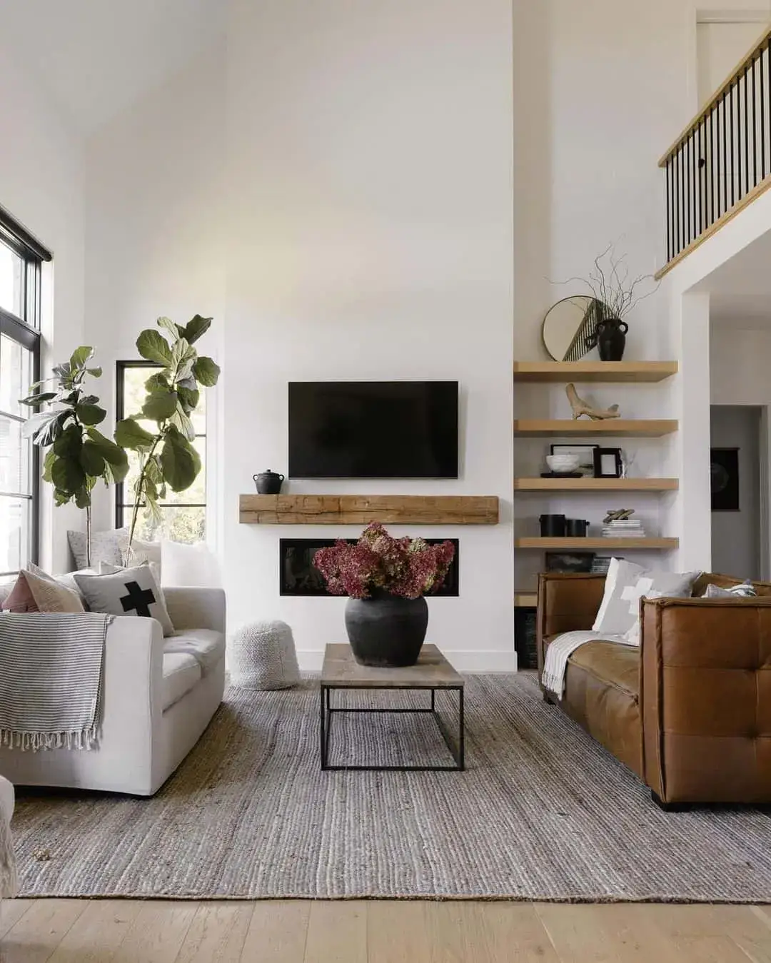 Floating Shelves Display a Round Mirror and Tall Vase