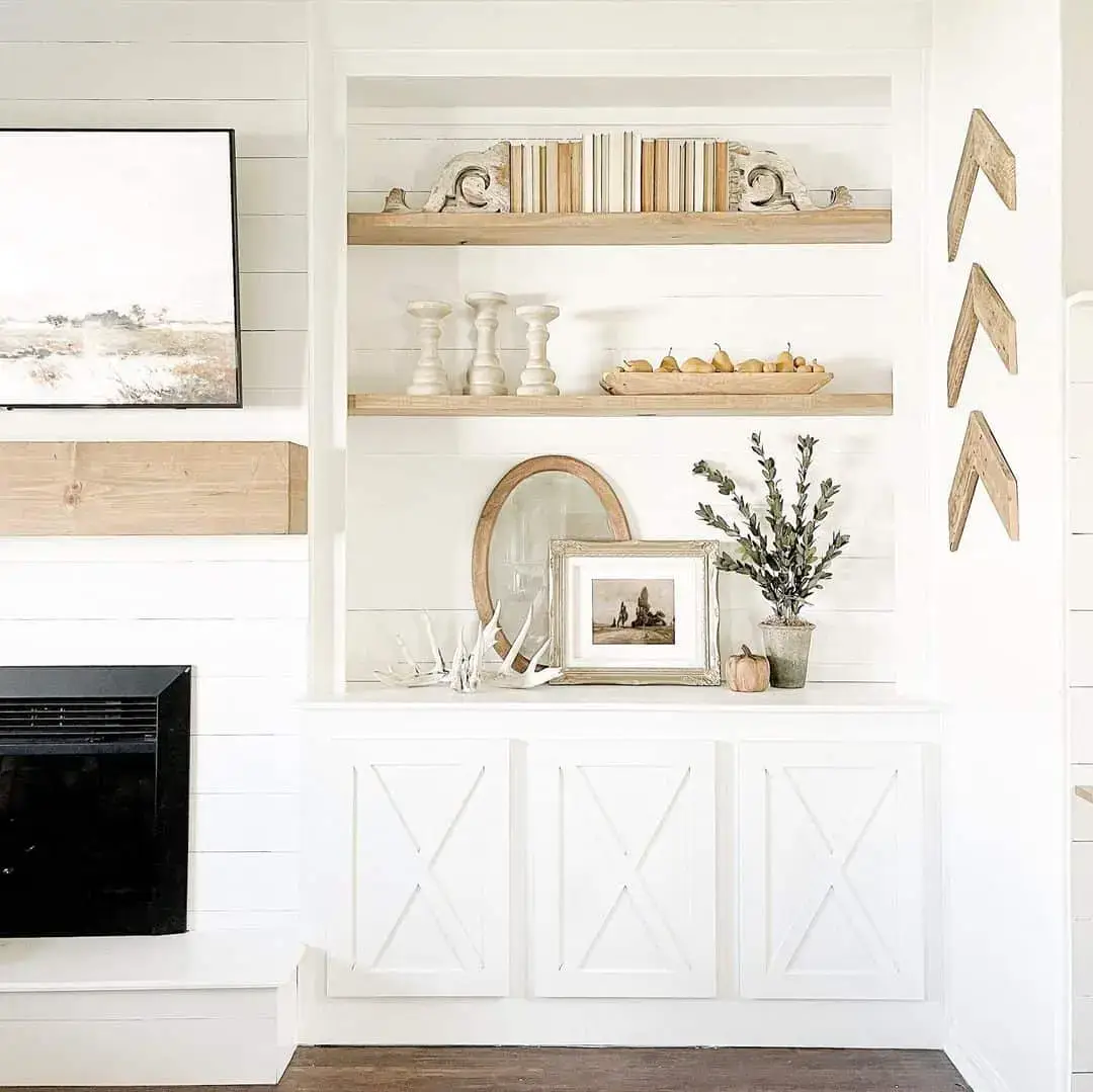 Wooden Shelves Hold Decorative Bowls and Antlers