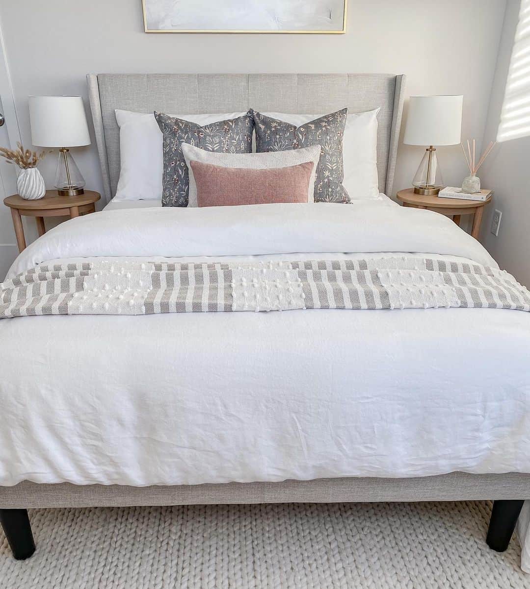 Layer a Striped Throw with Pom-Pom Texture