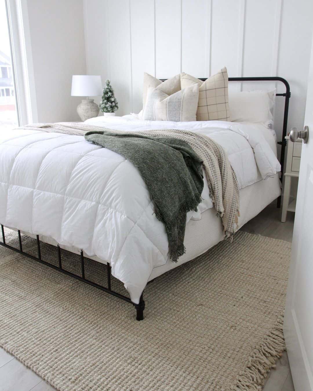 Anchor the Bed with a Textured Rug with Fringe