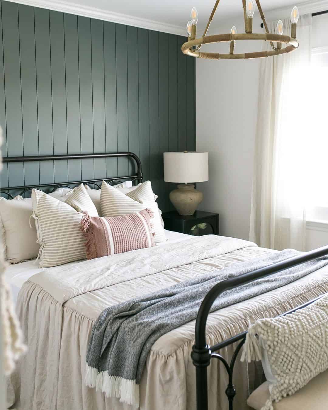 Dark Green Shiplap Walls Add Cozy Ambiance Above the Bed