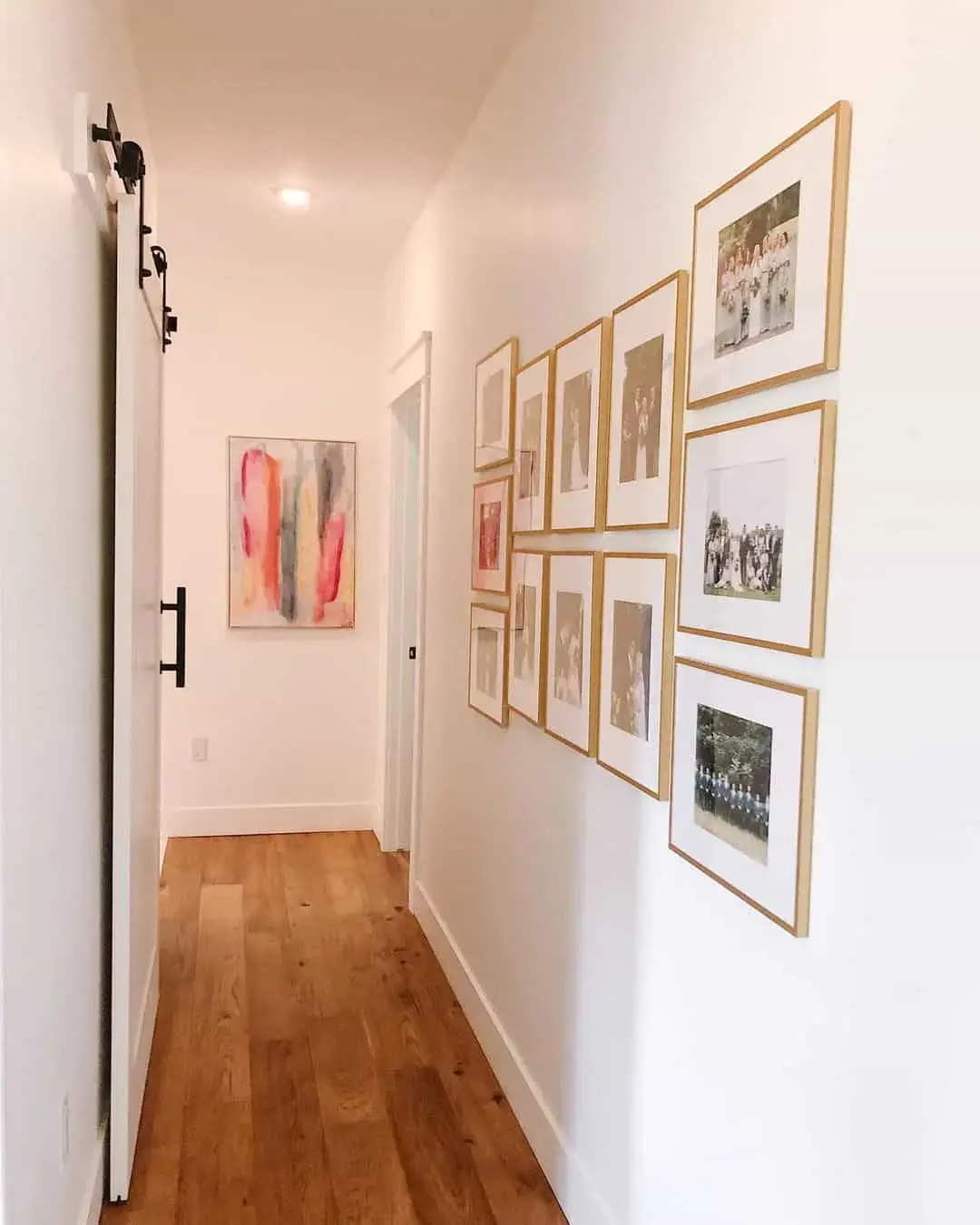 Gallery Wall of Family Photos Adds Personal Warmth