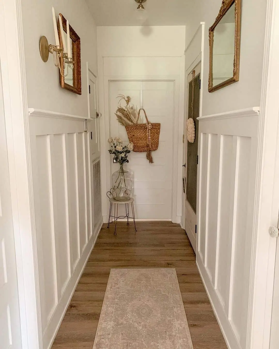 Woven Basket With Dried Stems Adds Boho Texture to Door