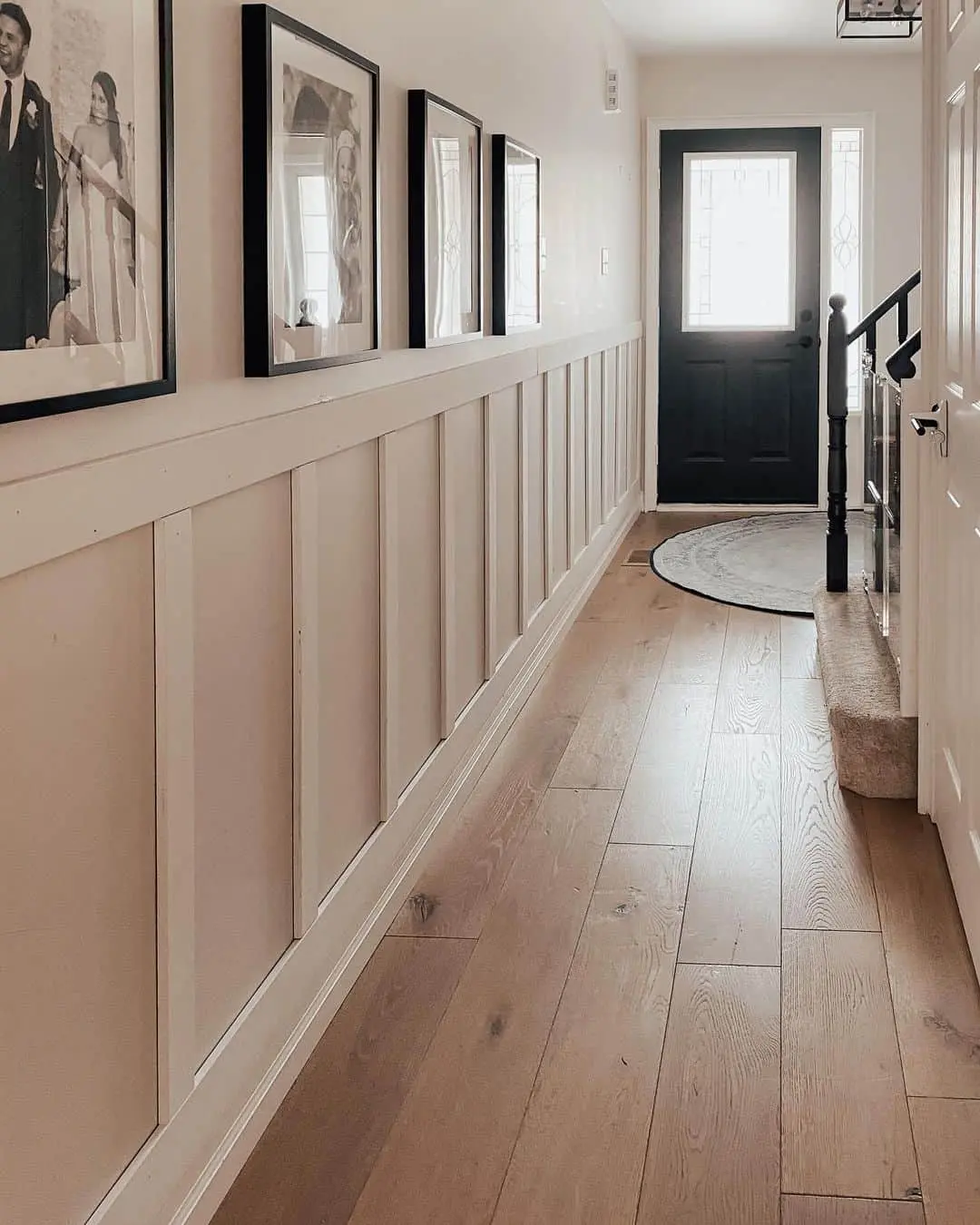 Black and White Portraits Add Classic Charm to Paneled Walls