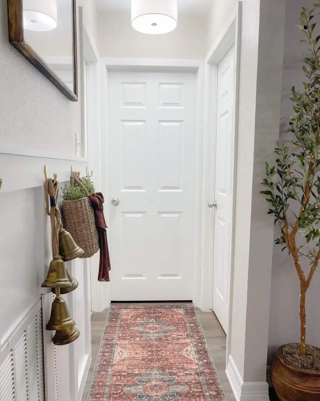 Brass Bells Add a Festive, Rustic Touch to Entryway Hooks