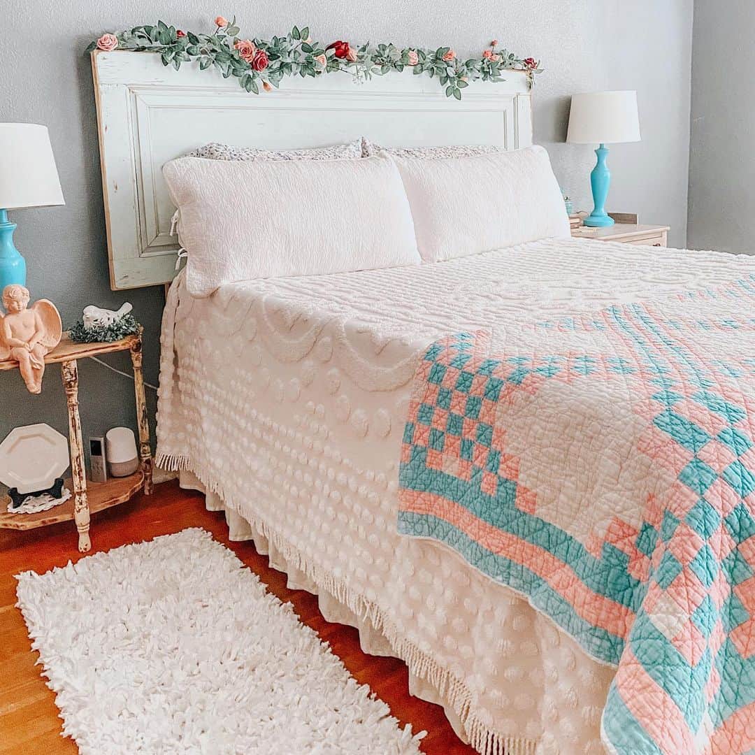 Repurposed Door Headboard Adorned With Floral Garland