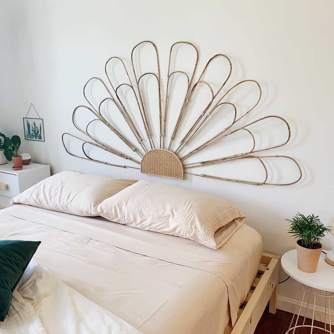 Peacock-Inspired Rattan Headboard Creates a Dramatic Focal Point