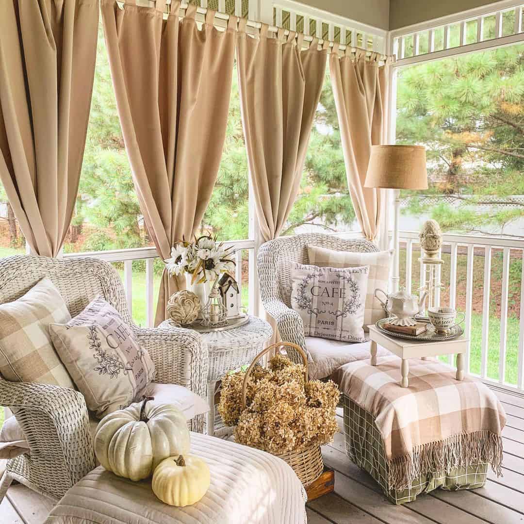 Neutral Curtains Create a Cozy, Enclosed Porch Vibe