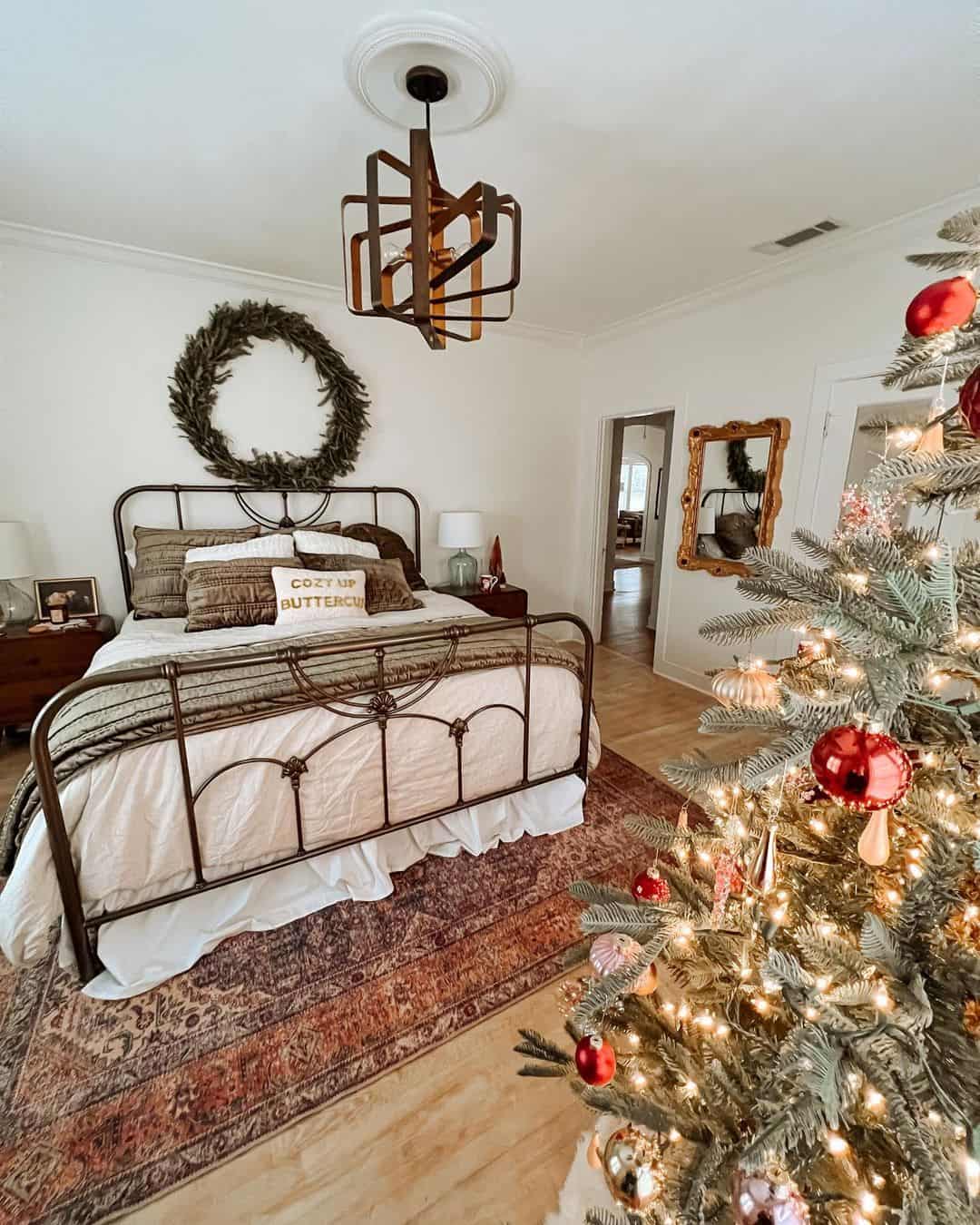 Large Greenery Wreath Adds Natural Texture Above Bed