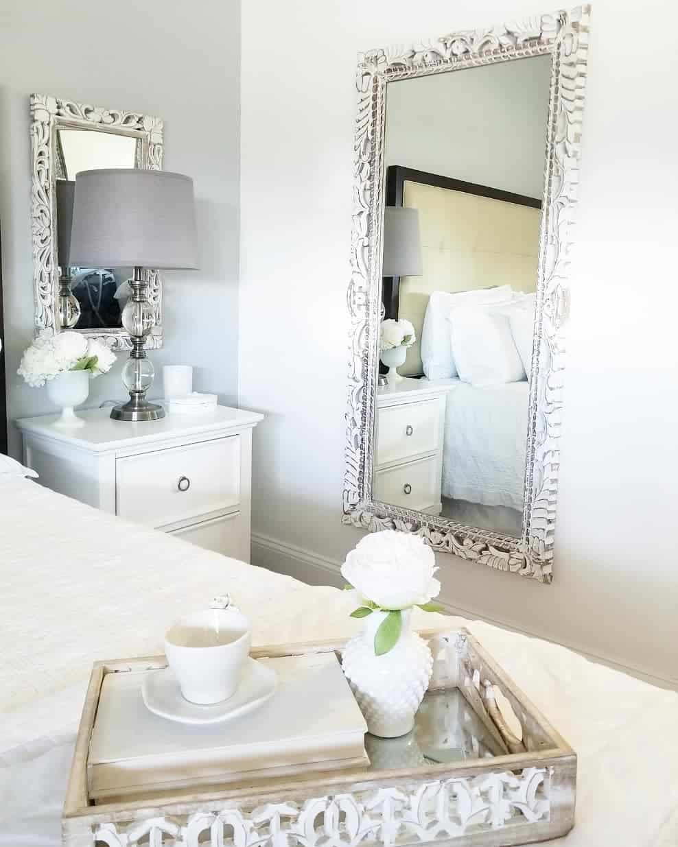 Ornate White Mirrors Add Dimension Above Nightstands