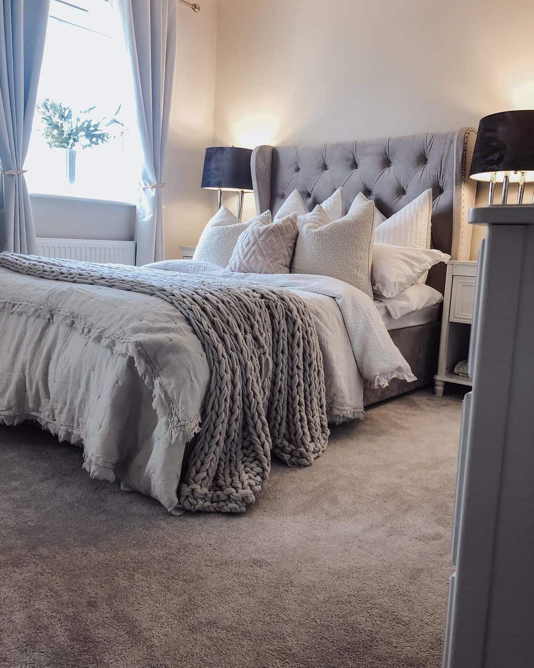 Layer a Chunky Knit Throw for Cozy Texture on Your Bed