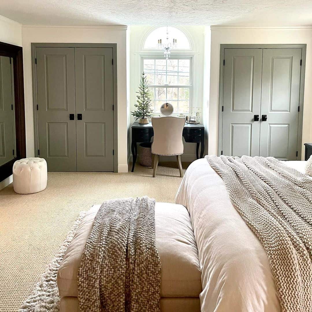 Blend Walls with Soft Gray Paneled Closet Doors
