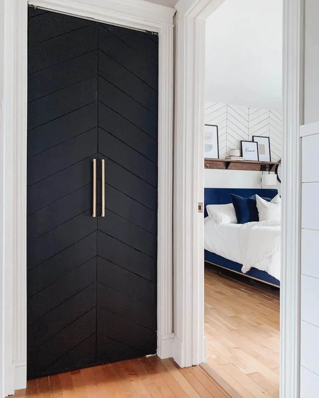 Black Chevron Closet Doors With Minimalist Brass Handles