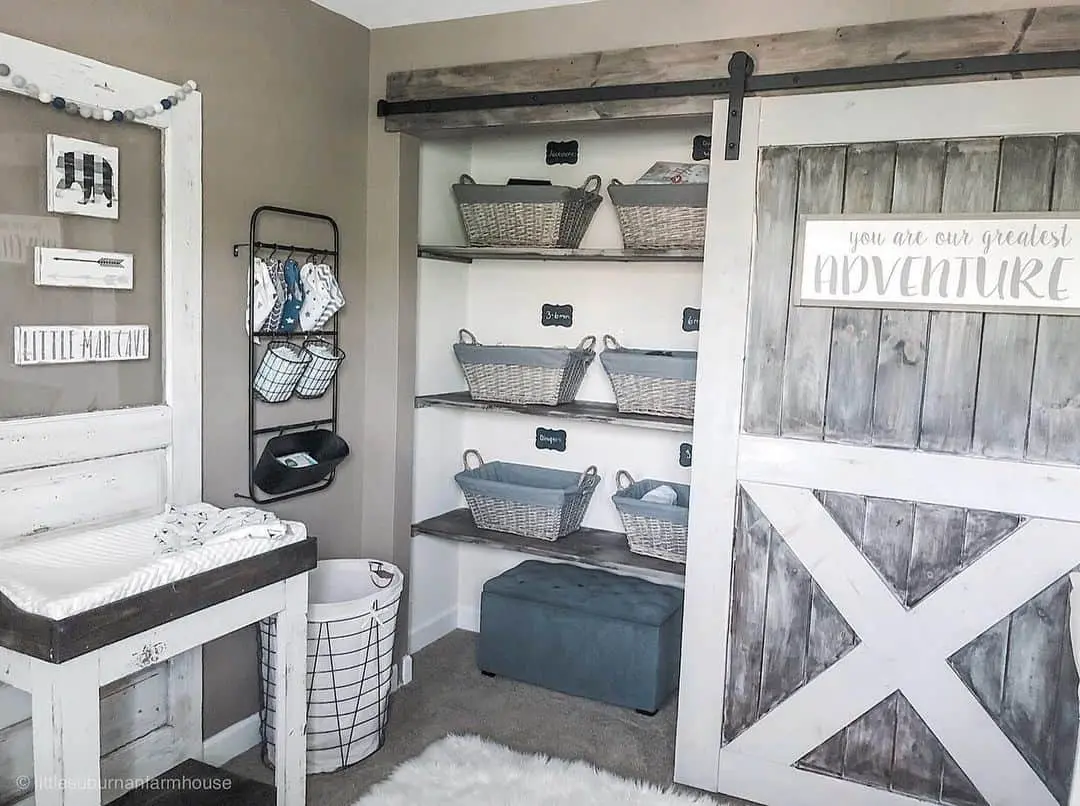 Rustic Barn Door with 'Adventure' Sign Hides Closet Space