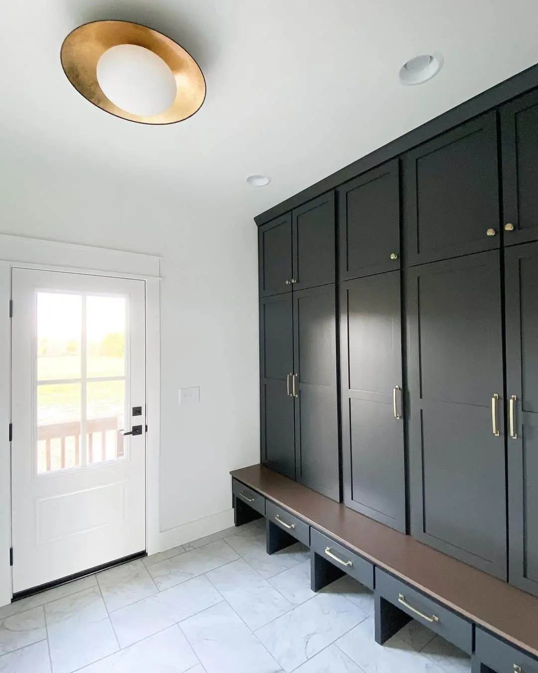 Dark Charcoal Closet Doors With Brass Hardware