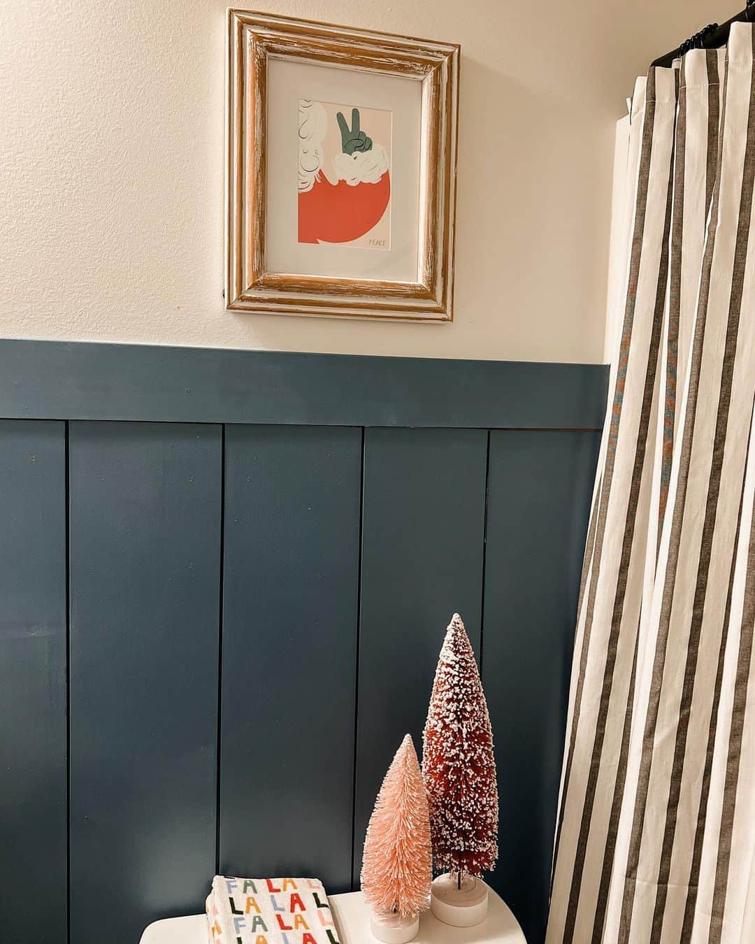 Festive Decor Framed by Deep Blue Board and Batten