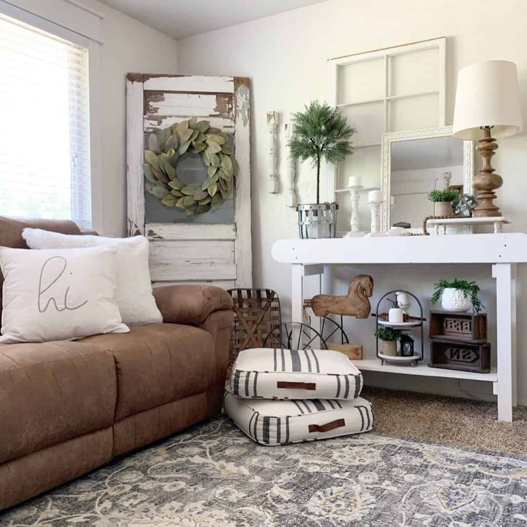 Distressed White Door as a Rustic Backdrop for a Leafy Wreath