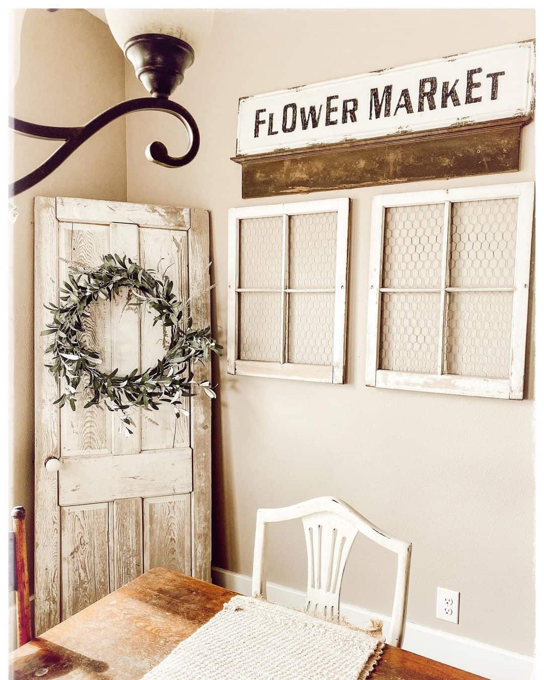 Vintage Door with Wreath Creates a Rustic Corner Accent