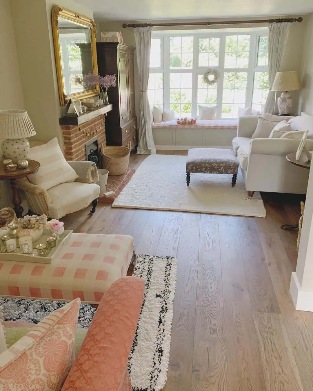 Incorporate a Pink Gingham Ottoman for Playful Patterned Anchor