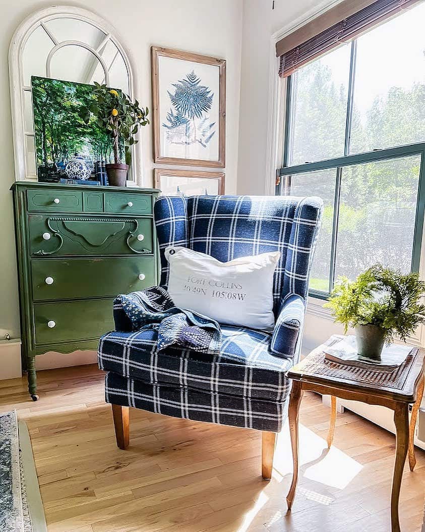 Green Dresser Displays Artwork and a Lemon Tree