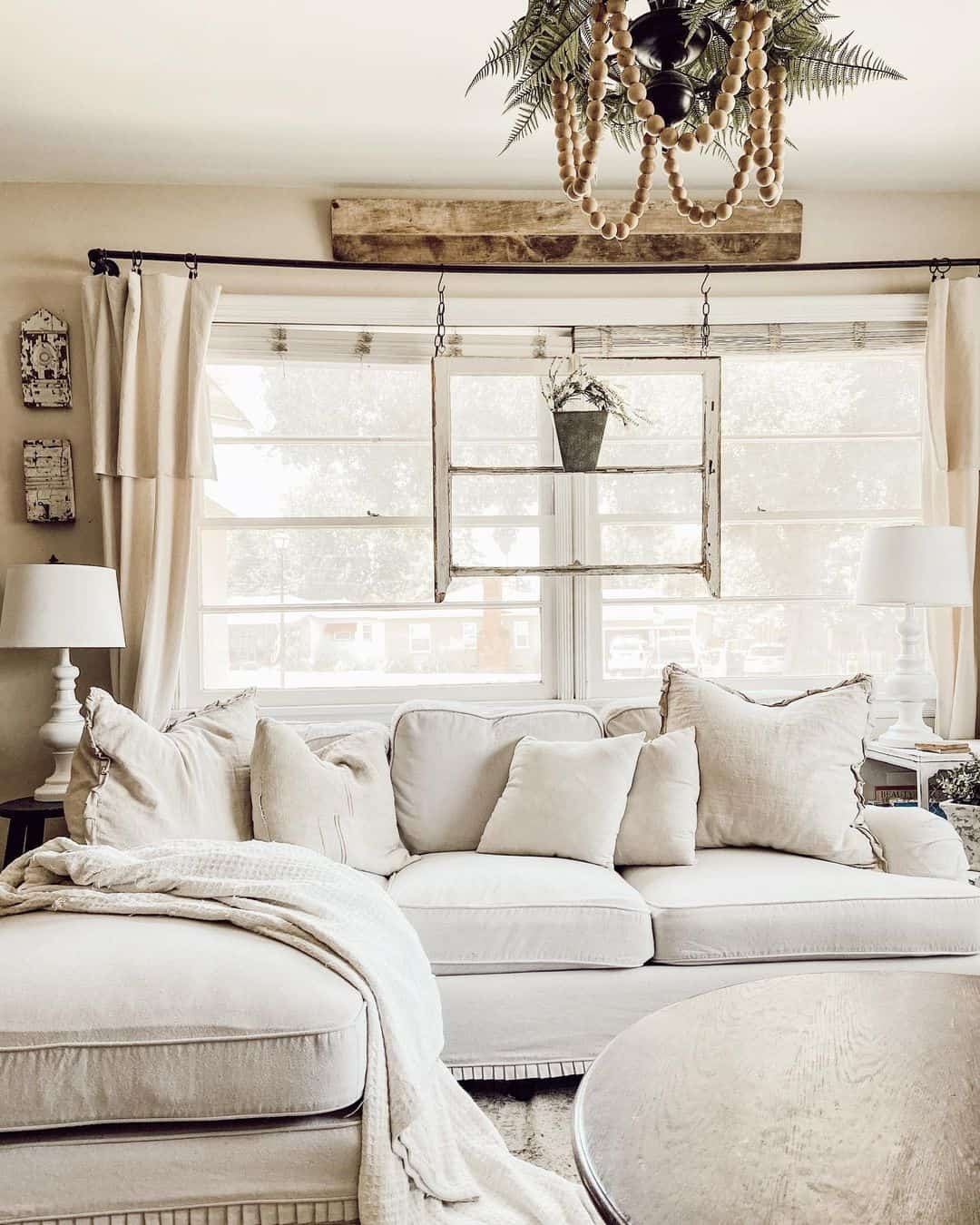 Hanging Window Frame Creates a Tiered Shelf for Greenery