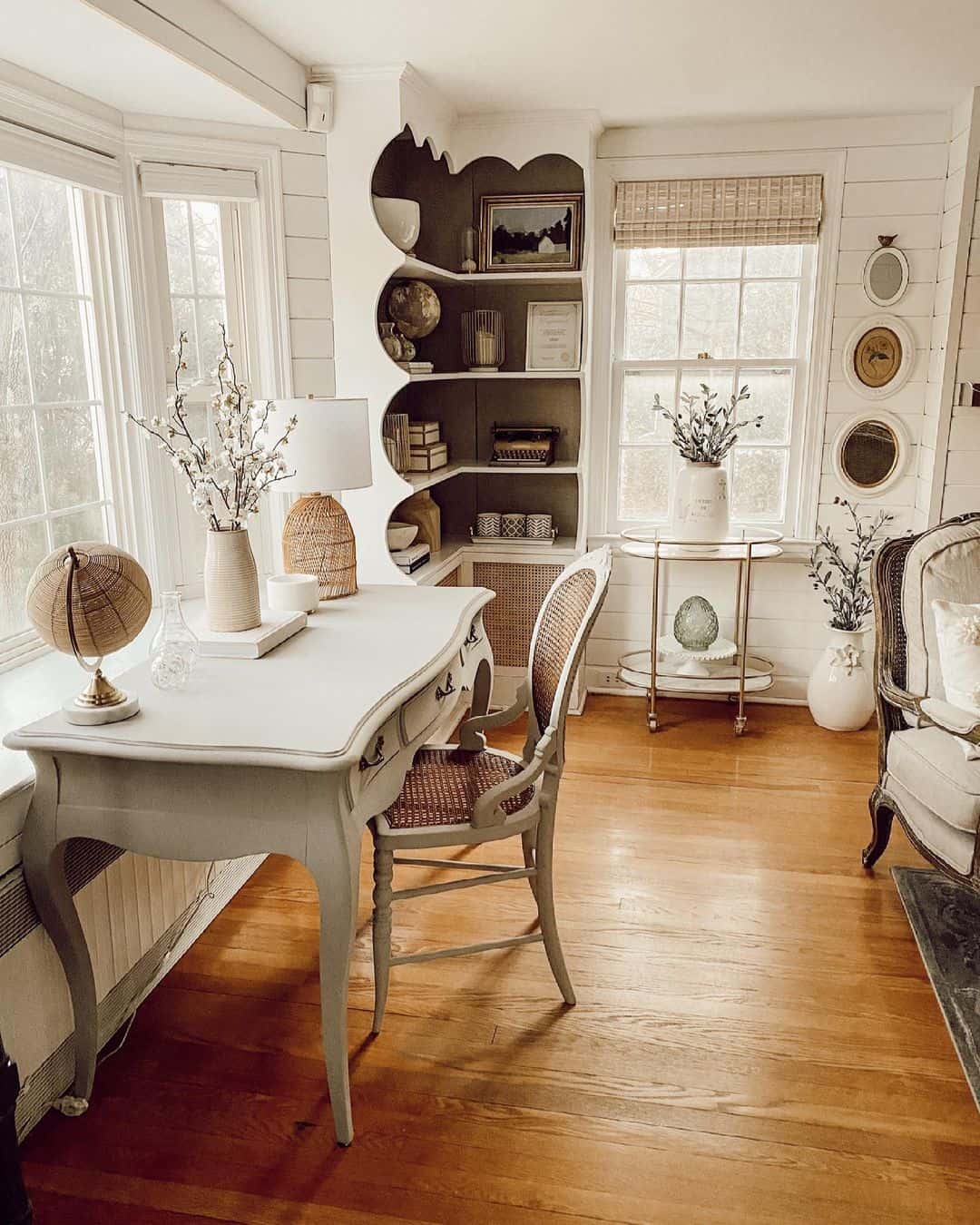 Curved-Leg Desk With Woven Cane Chair Creates a Vintage Workspace