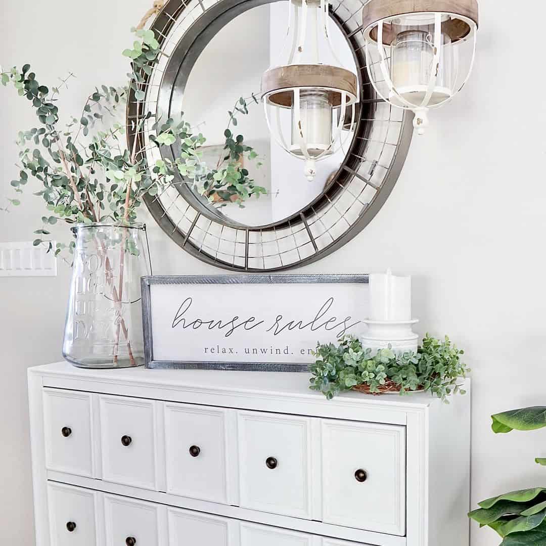 Tall Glass Jar Holds Eucalyptus Branches