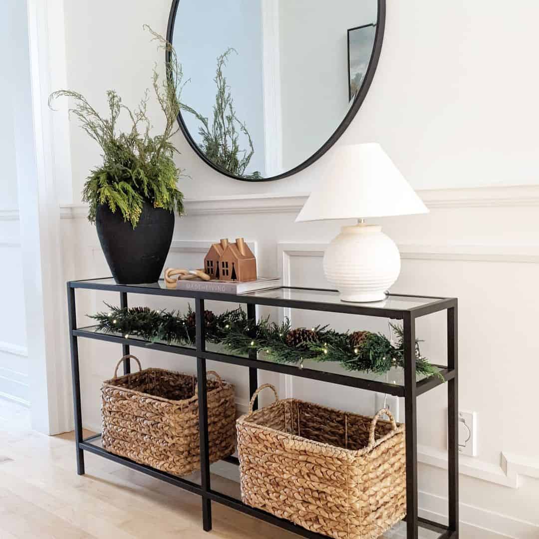 Layered Greenery and Lights Create a Festive Console Display