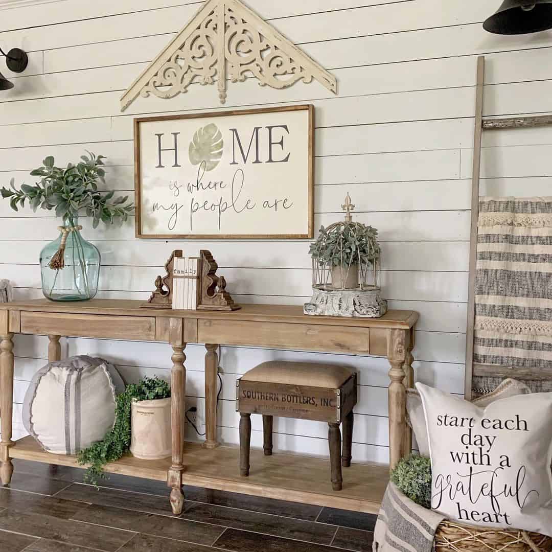 Wooden Birdcage Holds Greenery for a Rustic Accent