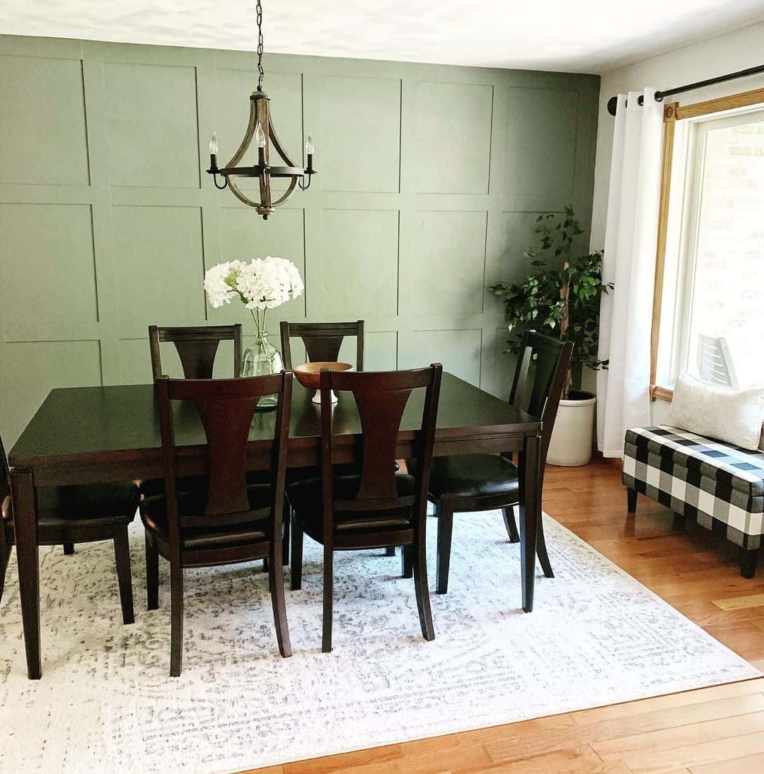 Subtle Green Board and Batten Walls Create a Dining Room Focal Point
