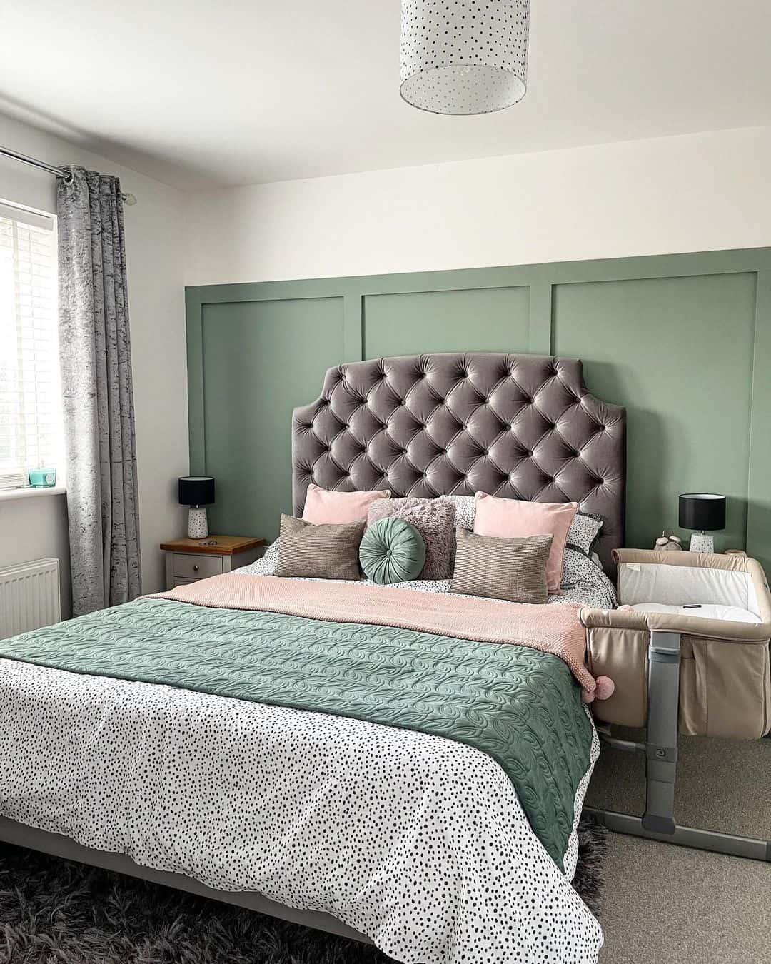 Green Board and Batten Walls Add Depth Behind a Tufted Headboard