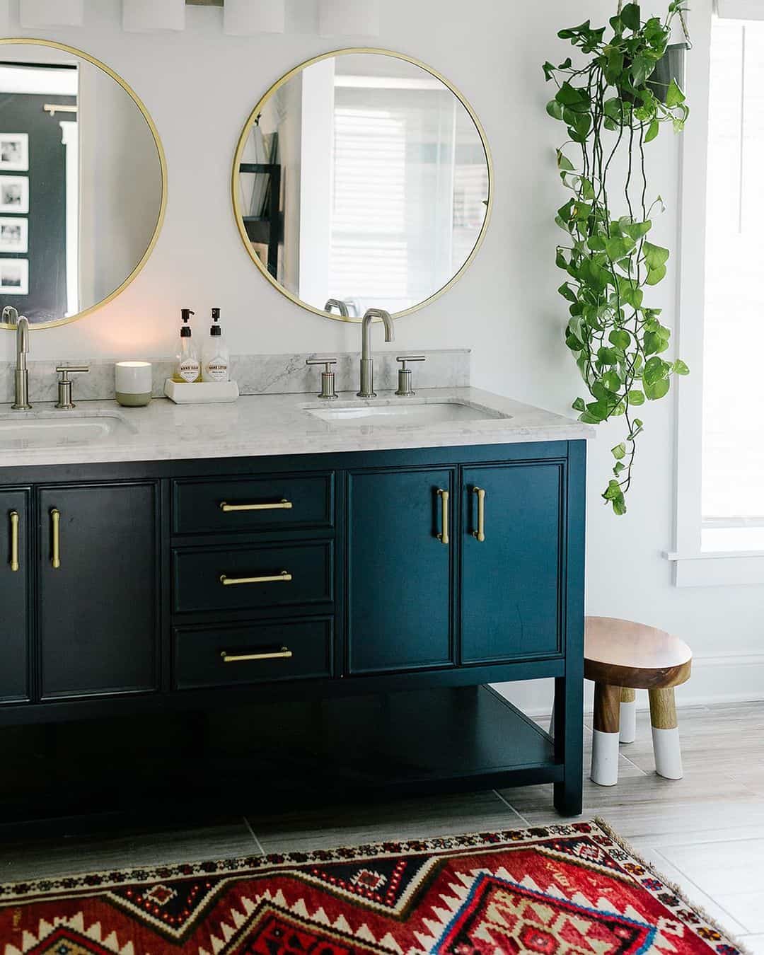 Introduce Rich Contrast with a Deep Teal Vanity and Gold Hardware