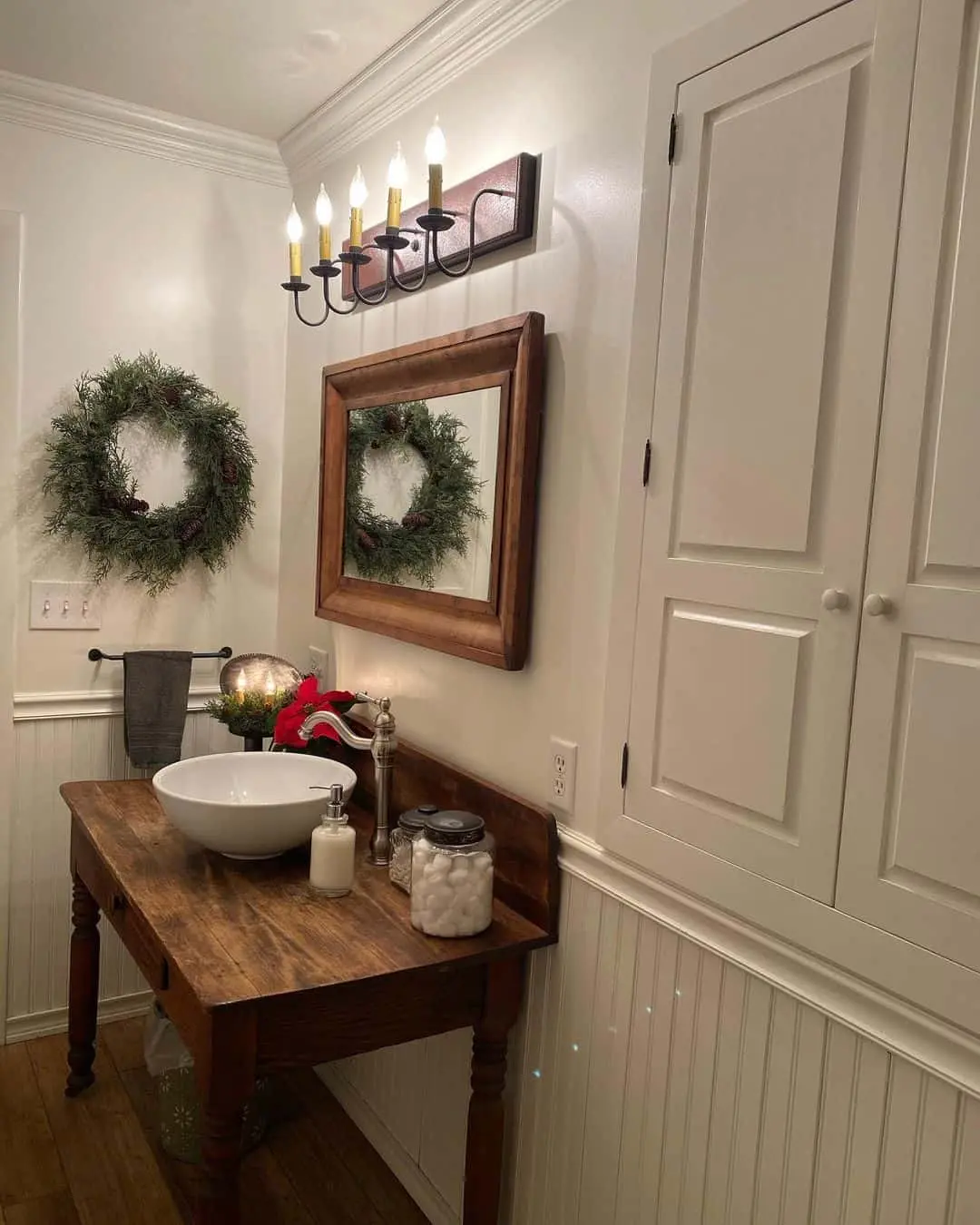 Wooden Console Vanity Holds Vessel Sink and Vintage Faucet