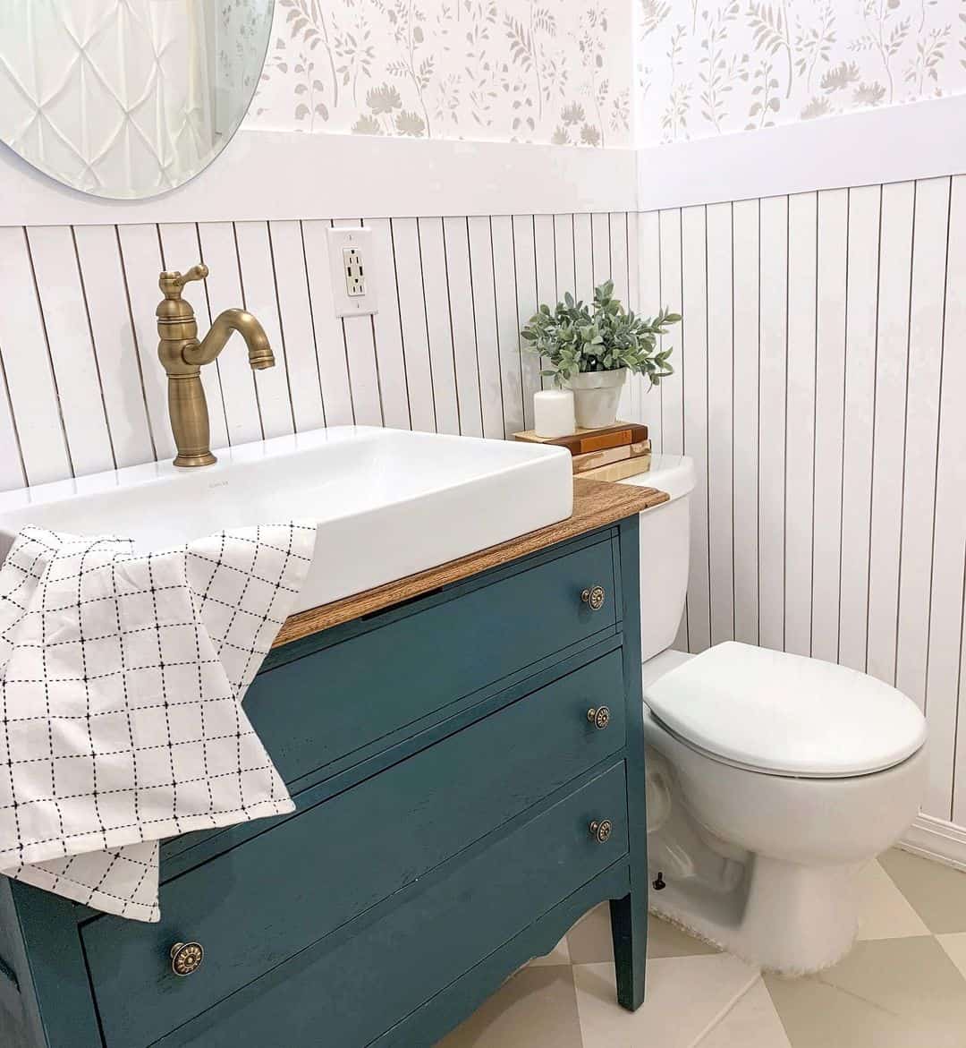 Ground Your Space with a Deep Teal Dresser Vanity