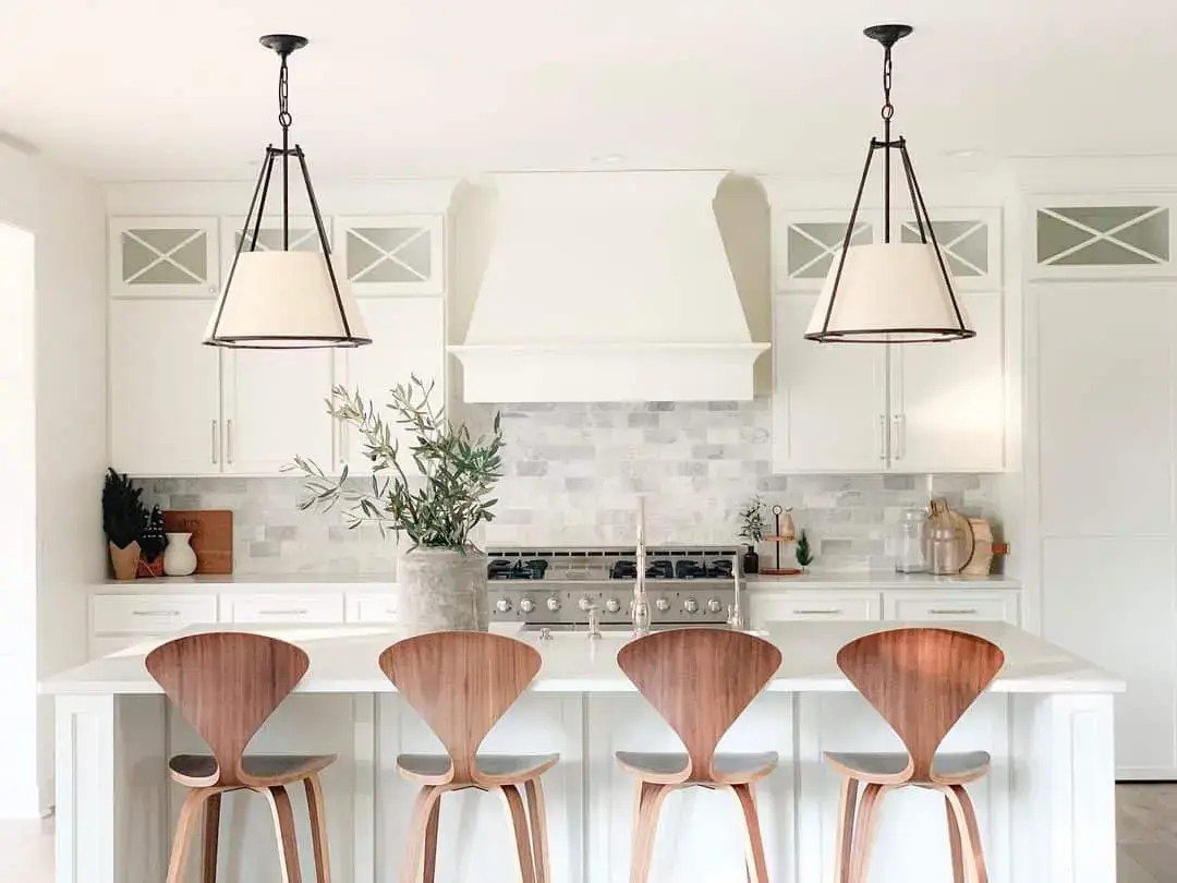 Sculptural Wood Stools Add Mid-Century Flair to Island Seating