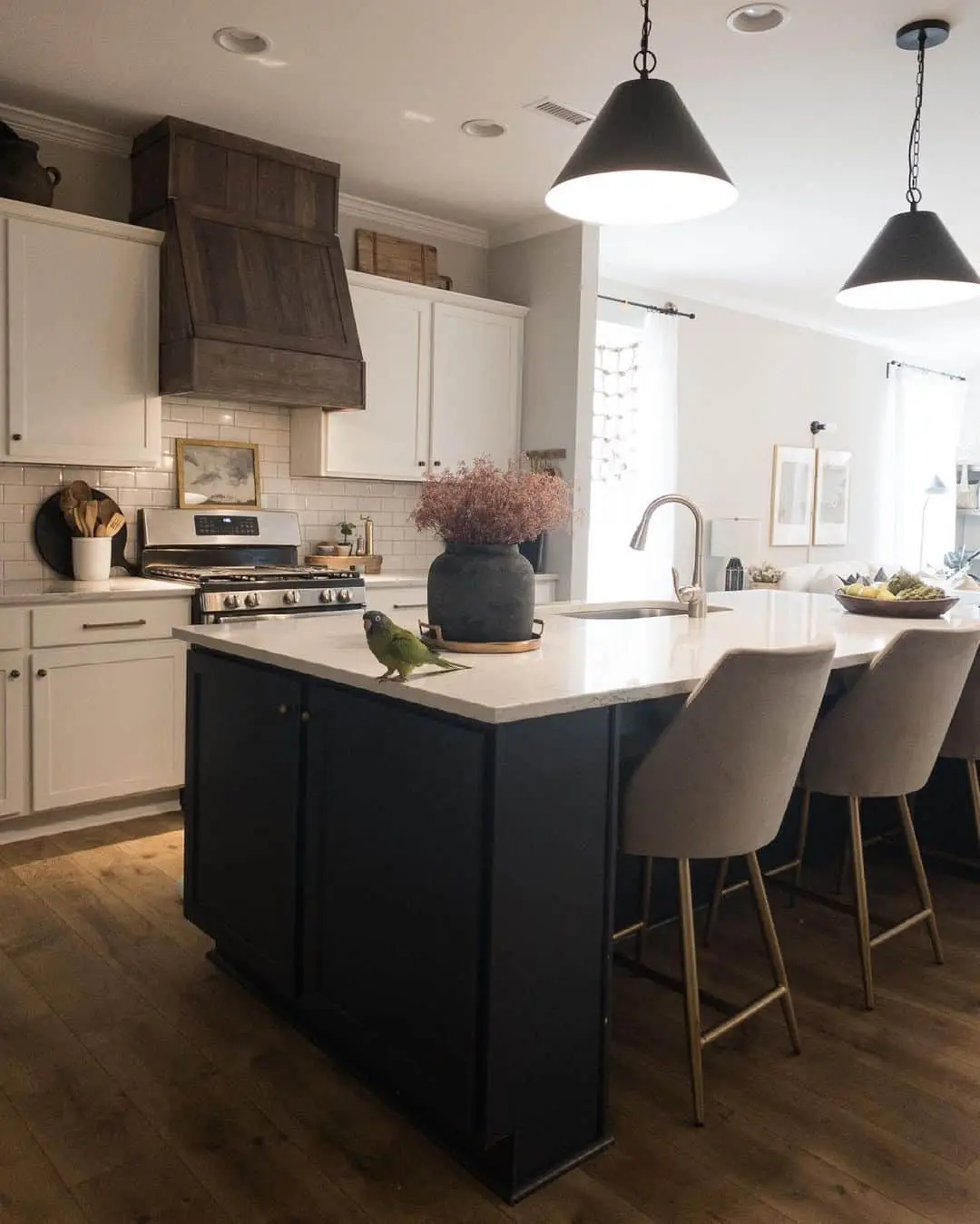 Dark Painted Island Base With Gold-Legged Bar Stools