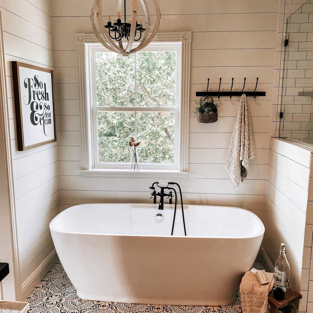 Black Hooks Organize Towels and Baskets on Shiplap Walls