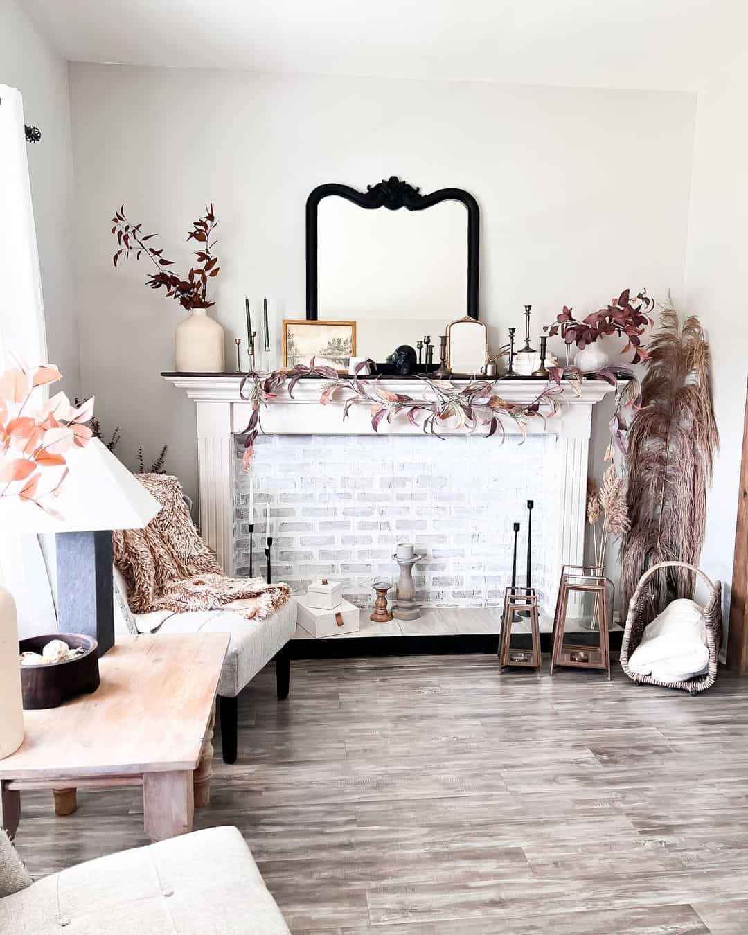 Ornate Black Mirror Contrasts with White Brick Fireplace
