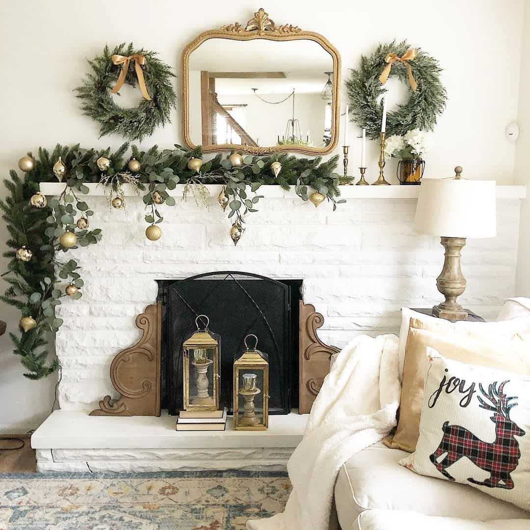 Ornate Mirror Anchors a Festive Garland and Wreath Display